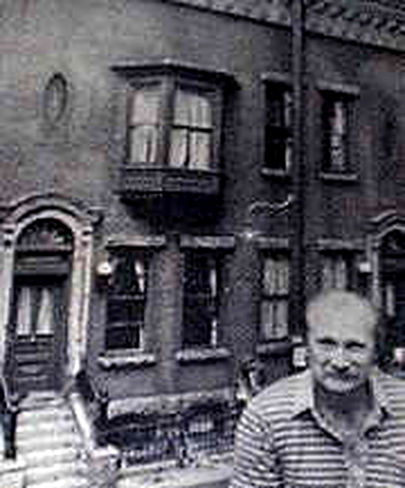 Artist Michael Garman with his cityscape
